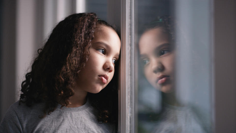 A child looking out the window