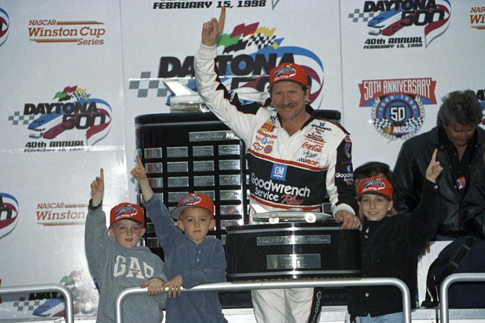 Dale Earnhardt celebrates a 1998 Daytona 500 victory with, from left, Ty Dillon, Austin Dillon and Taylor Nicole Earnhardt.