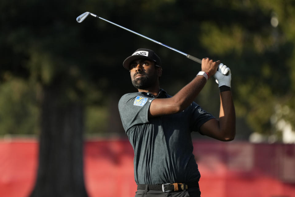 Sahith Theegala follows his shot from the 18th fairway of the Silverado Resort North Course during the final round of the Fortinet Championship PGA golf tournament in Napa, Calif., Sunday, Sept. 17, 2023. (AP Photo/Eric Risberg)