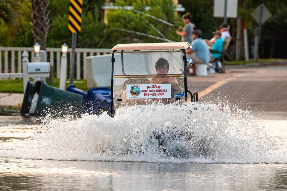 Streets flood during King Tides Cherry Grove section of North Myrtle Beach. Aug. 11, 2021.