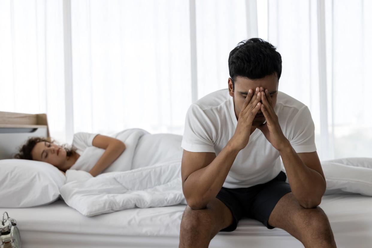 <span class="caption">New research has found that some men who have had COVID-19 might experience unwanted sexual side effects.</span> <span class="attribution"><a class="link " href="https://www.gettyimages.com/detail/photo/upset-depressed-young-man-sitting-on-the-edge-of-royalty-free-image/1164742167?adppopup=true" rel="nofollow noopener" target="_blank" data-ylk="slk:tuaindeed/iStock via Getty Images;elm:context_link;itc:0;sec:content-canvas">tuaindeed/iStock via Getty Images</a></span>