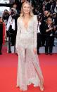 The model chooses a plunging sheer lace Etro couture gown with center slit, Chopard jewelry and Aquazzura sandas for the premiere of <em>The Dead Don't Die</em> during the opening ceremony.