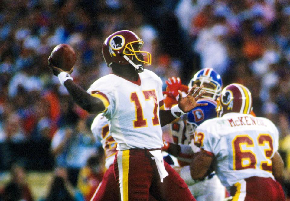 Jan 31, 1988; San Diego, CA, USA; FILE PHOTO; Washington Redskins quarterback Doug Williams (17) looks to throw against the Denver Broncos during Super Bowl XXII at Jack Murphy Stadium. Washington defeated Denver 42-10. Mandatory Credit: Manny Rubio-USA TODAY Sports