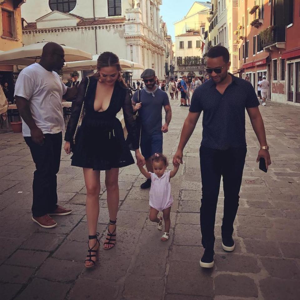 Chrissy, John, and Luna take a stroll