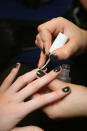 <b>Daks </b><br><br>Models' nailed were painted with Revlon Colorstay Nail Enamel in Jungle.<br><br>Image © Revlon