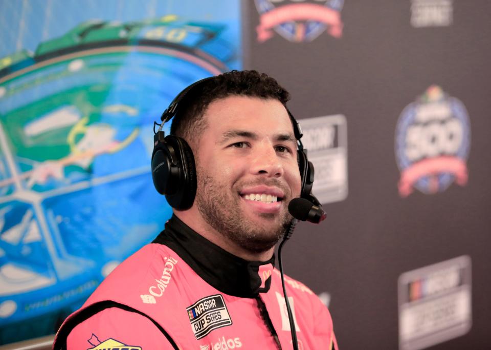 Bubba Wallace answers questions from the media during Media Day at Daytona International Speedway, Wednesday, Feb. 14, 2024.