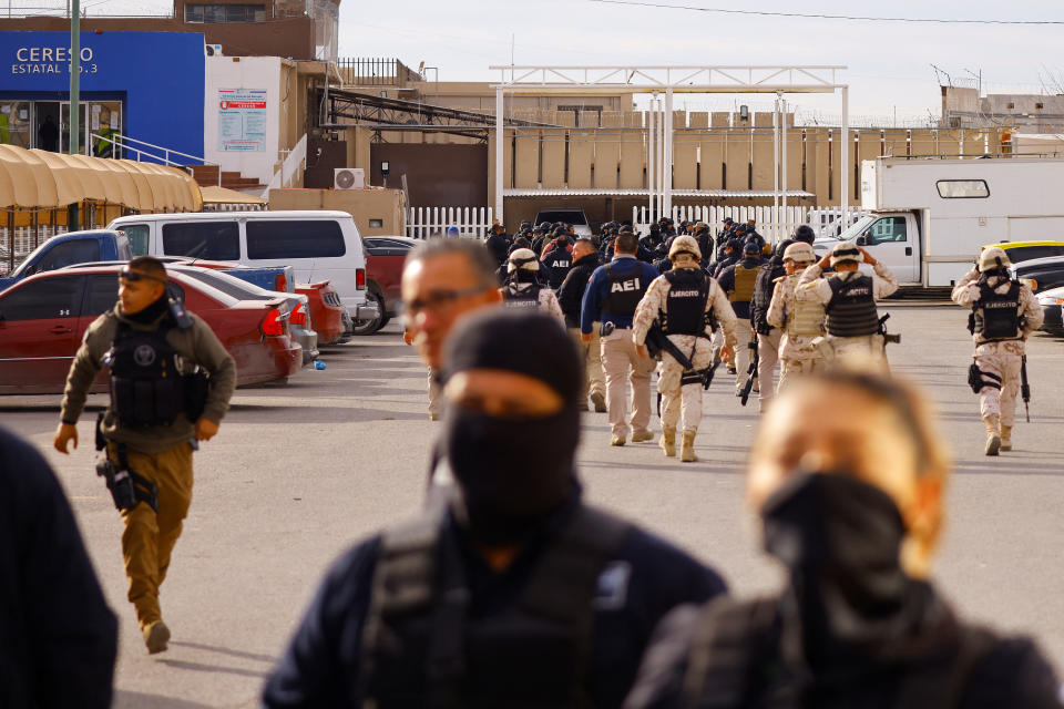 Security forces arrive at Cereso State Prison Number 3 after unknown assailants entered the prison and freed several inmates, resulting in injuries and deaths, according to local media, in Ciudad Juarez, Mexico January 1, 2023. REUTERS/Jose Luis Gonzalez