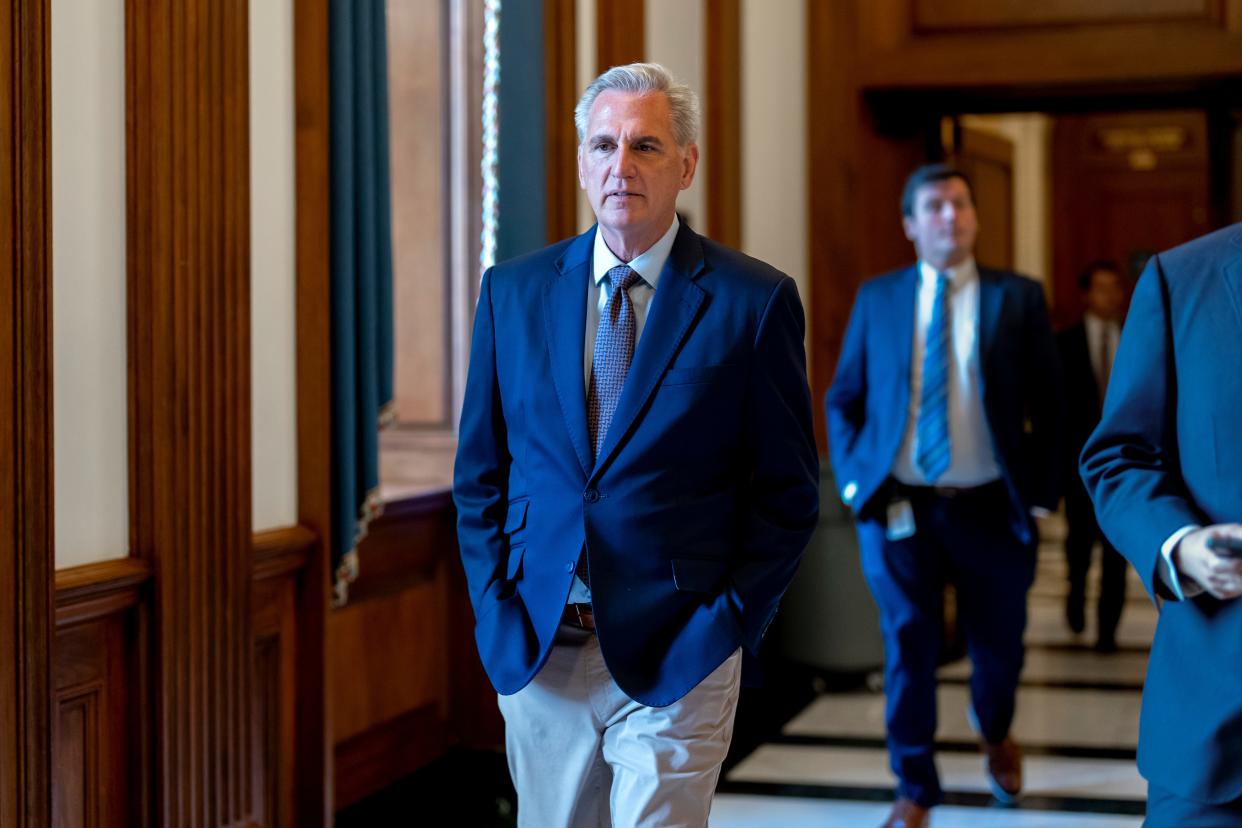 House Minority Leader Kevin McCarthy, R-Calif., walks to his office from the chamber during final votes as the House wraps up its work for the week, at the Capitol in Washington, Friday, Dec. 2, 2022. McCarthy is seeking enough GOP backing to become Democrat Nancy Pelosi's successor when Republicans take control of the House in the new Congress.