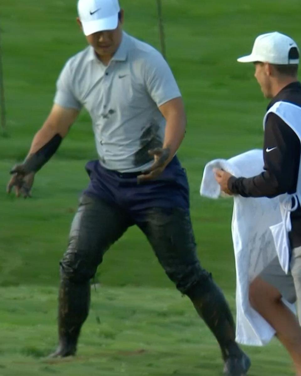 Tom Kim was covered in mud in the first round of the PGA Championship at Oak Hill.