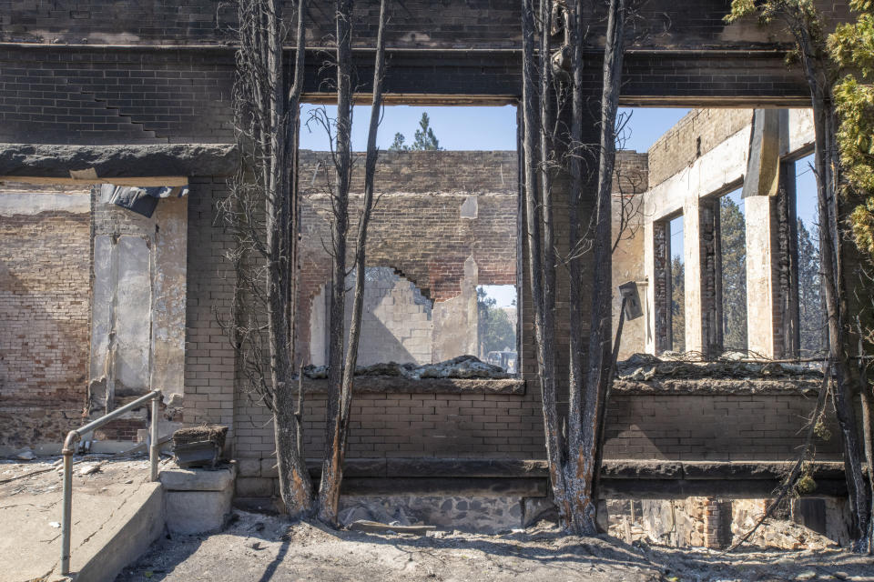 A commercial building that was destroyed by wildfire is shown Tuesday, Sept. 8, 2020, in Malden, Wash. High winds kicked up wildfires across the Pacific Northwest on Monday and Tuesday, burning hundreds of thousands of acres and mostly destroying the small town of Malden in eastern Washington state. (AP Photo/Jed Conklin)