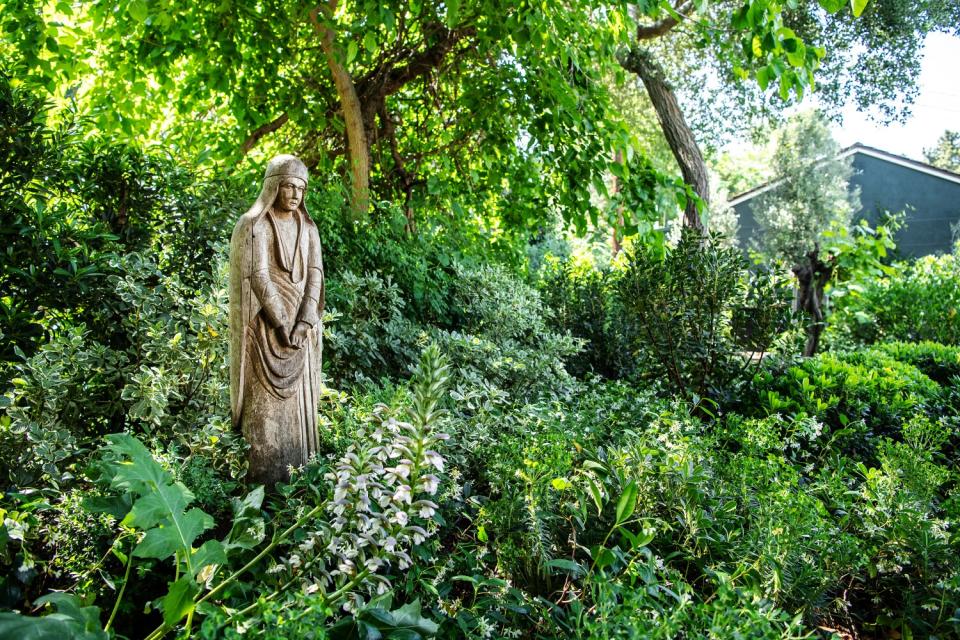 A statue in a garden