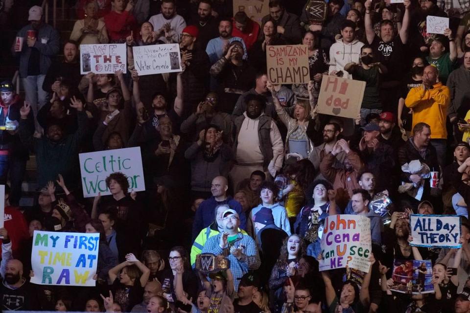 Wrestling fans during the WWE Monday Night RAW event, Monday, March 6, 2023, in Boston.