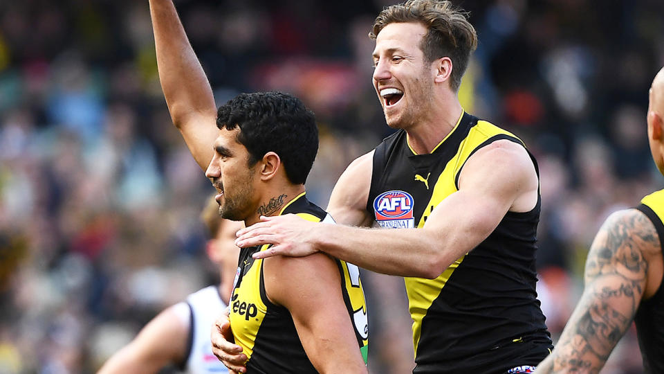 Marlion Pickett, pictured after kicking his first goal in AFL, has become an instant cult hero for Richmond Tigers fans.