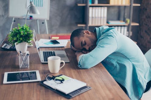 <span class="caption">Time changes interrupt our internal "body clock". </span> <span class="attribution"><a class="link " href="https://www.shutterstock.com/image-photo/sweet-dreams-work-station-sleepy-tired-735692446" rel="nofollow noopener" target="_blank" data-ylk="slk:Roman Samborskyi/ Shutterstock;elm:context_link;itc:0;sec:content-canvas">Roman Samborskyi/ Shutterstock</a></span>