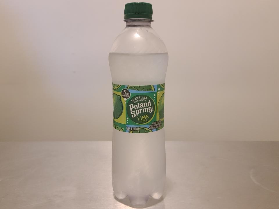 bottle of poland spring lime sparkling water on a kitchen counter