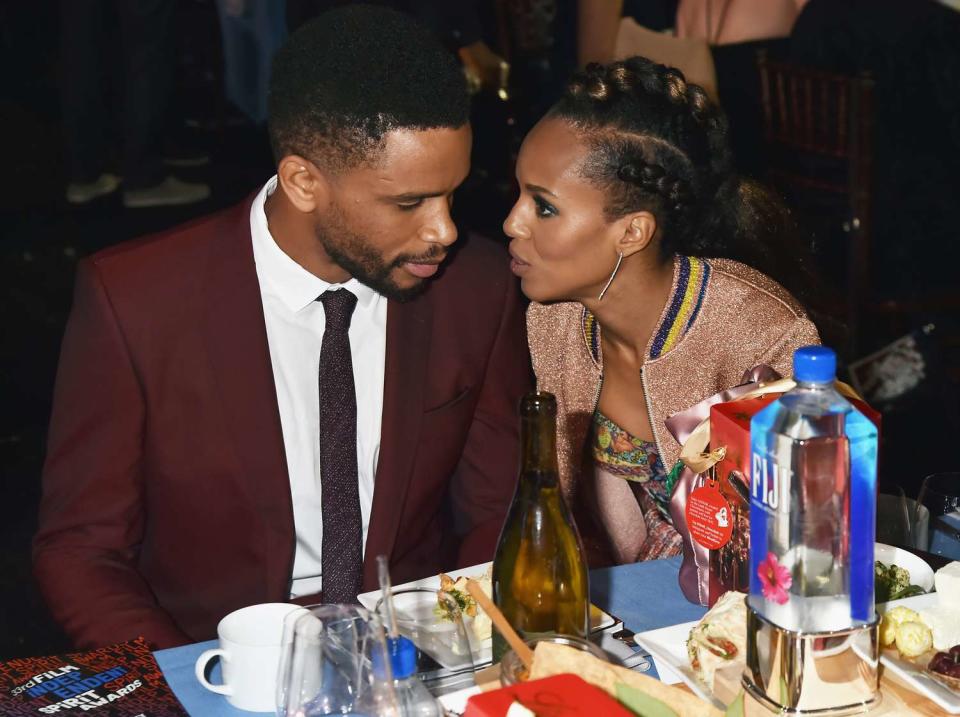 Actors Nnamdi Asomugha (L) and Kerry Washington with FIJI Water during the 33rd Annual Film Independent Spirit Awards on March 3, 2018 in Santa Monica, California