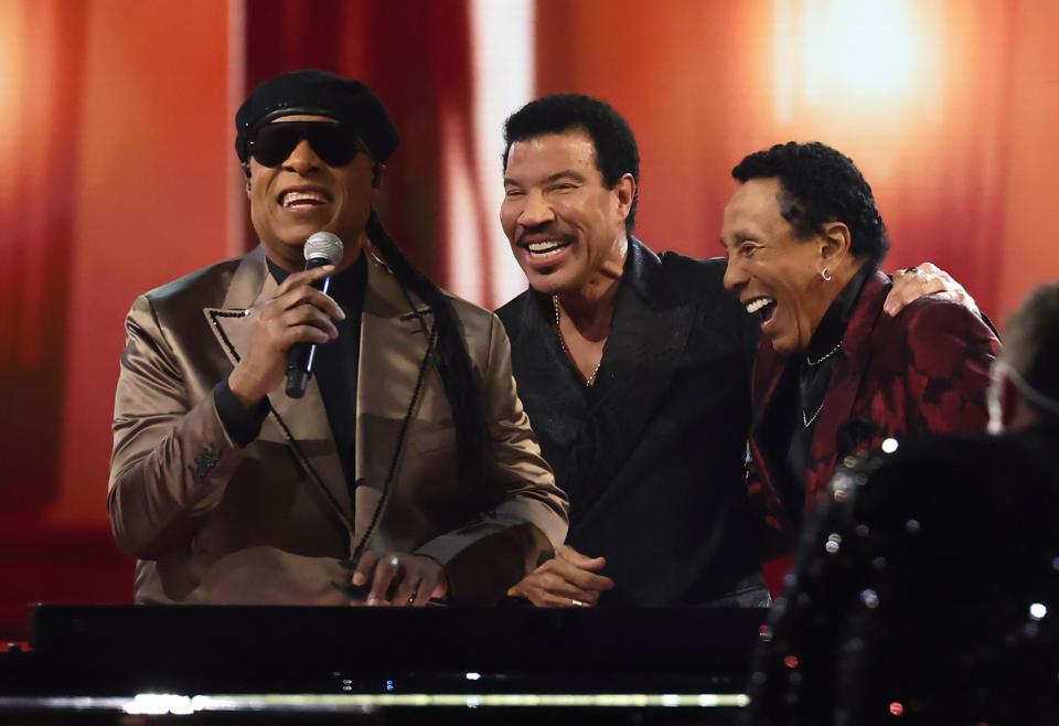 Stevie Wonder, Smokie Robinson, and Lionel Richie on stage