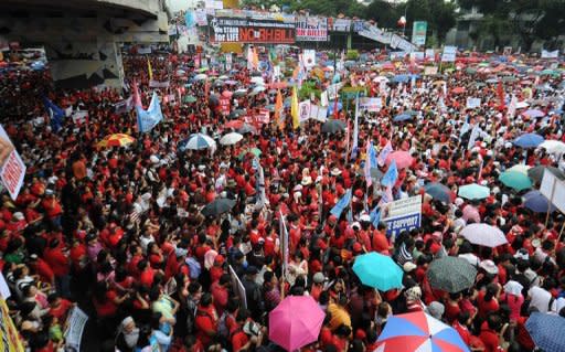 Some 7,000 Catholic people attend an anti reproductive health (RH) bill rally in Manila. The Philippines' dominant Roman Catholic church sent thousands of its members on the streets of the capital against a proposed law that seeks to induce the poor to have less children