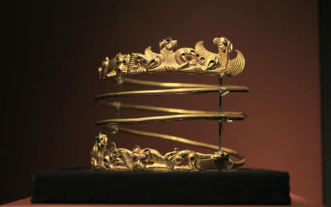 A spiraling torque from the second century AD is displayed as part of the exhibit of Scythian artefacts in Amsterdam - Credit: Peter Dejong/AP Photo