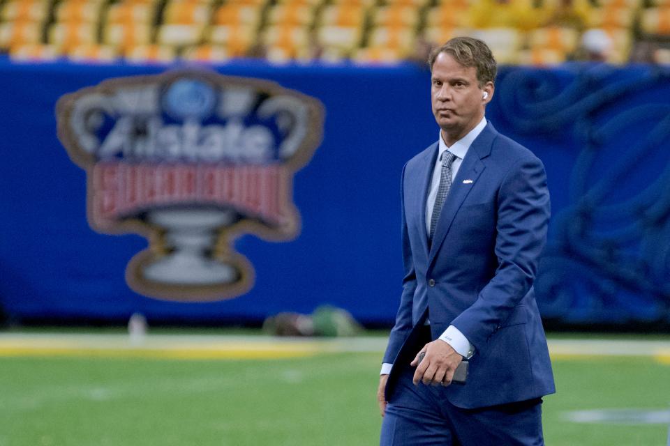Mississippi coach Lane Kiffin walks on the field before the team's Sugar Bowl NCAA college football game against Baylor in New Orleans, Saturday, Jan. 1, 2022. (AP Photo/Matthew Hinton)