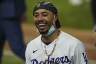 Los Angeles Dodgers right fielder Mookie Betts celebrates after defeating the Tampa Bay Rays 3-1 to win the baseball World Series in Game 6 Tuesday, Oct. 27, 2020, in Arlington, Texas. (AP Photo/Eric Gay)