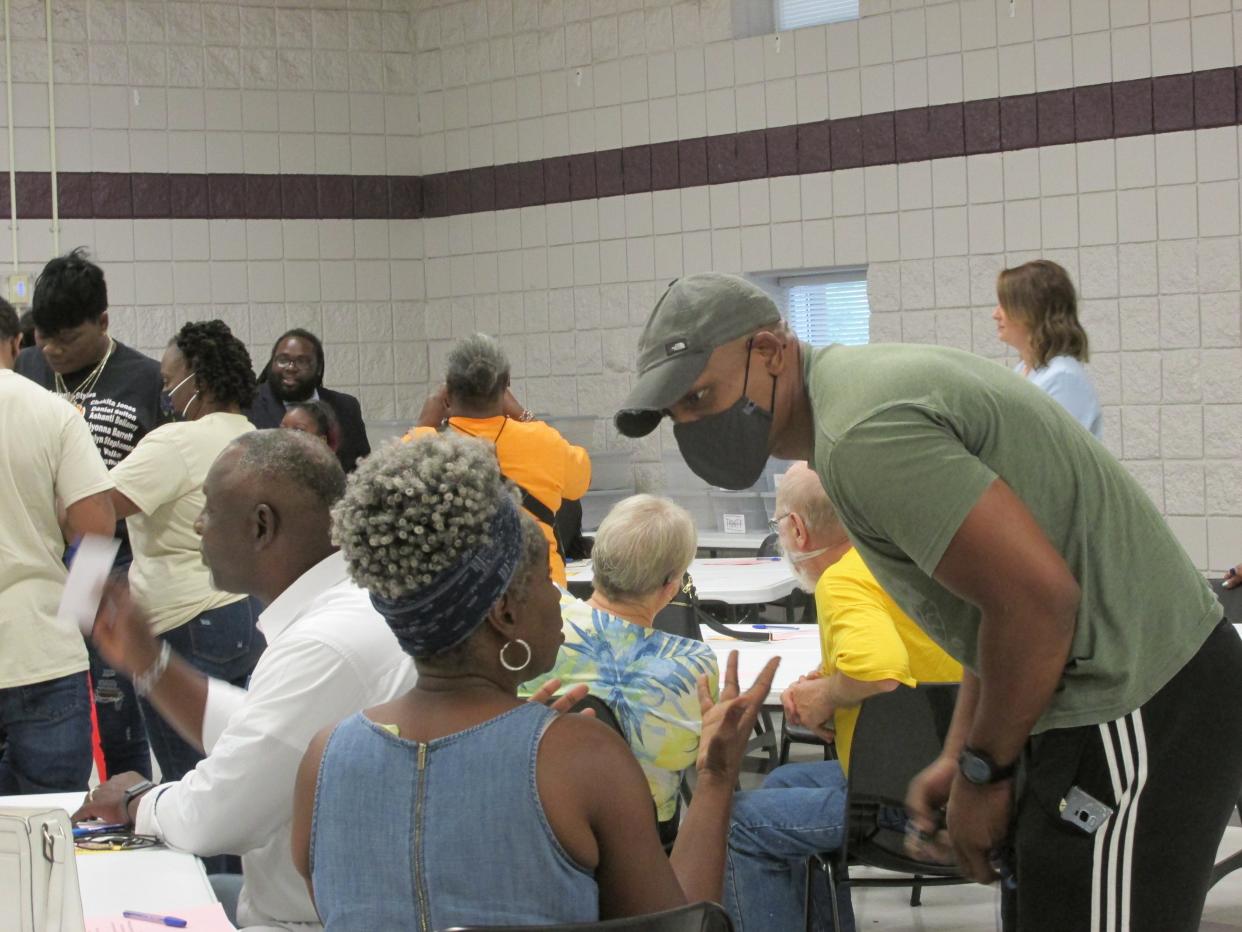 Community members gather during a community forum discussion about gun violence Tuesday, June 7, 2022, at the Kiwanis Recreation Center in Fayetteville.