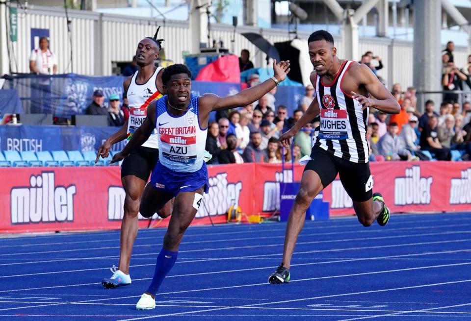 Jeremiah Azu, centre, was the men’s 100m champion in Manchester (Martin Rickett/PA) (PA Wire)