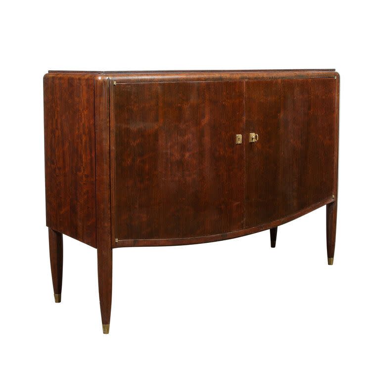 <p><a href="https://www.highstyledeco.com/cabinets/art-deco-directoire-style-burled-amp-bookmatched-acacia-cabinet-w-bronze-fittings" rel="nofollow noopener" target="_blank" data-ylk="slk:Shop Now;elm:context_link;itc:0;sec:content-canvas" class="link rapid-noclick-resp">Shop Now</a></p><p>Signed Jules Leleu Art Deco Directoire Style Burled & Bookmatched Acacia Cabine</p><p>highstyledeco.com</p><p>$18475.00</p>