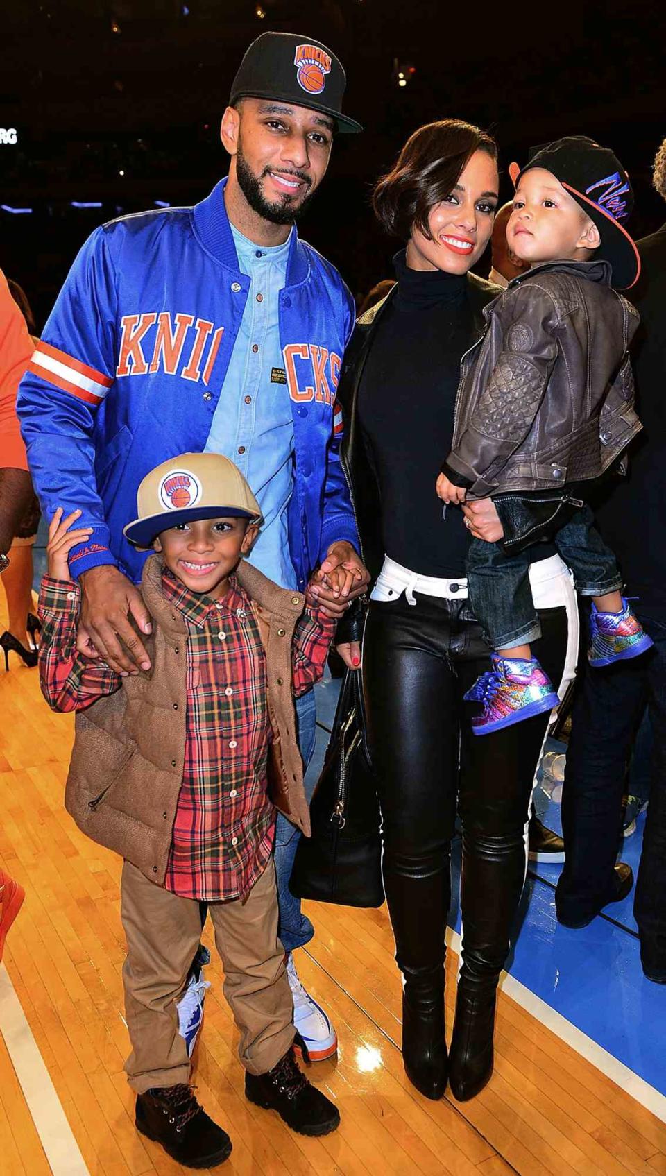 Swizz Beatz, Kasseem David Dean Jr, Alicia Keys and Egypt Dean attend the Miami Heat vs New York Knicks game at Madison Square Garden on November 2, 2012 in New York City