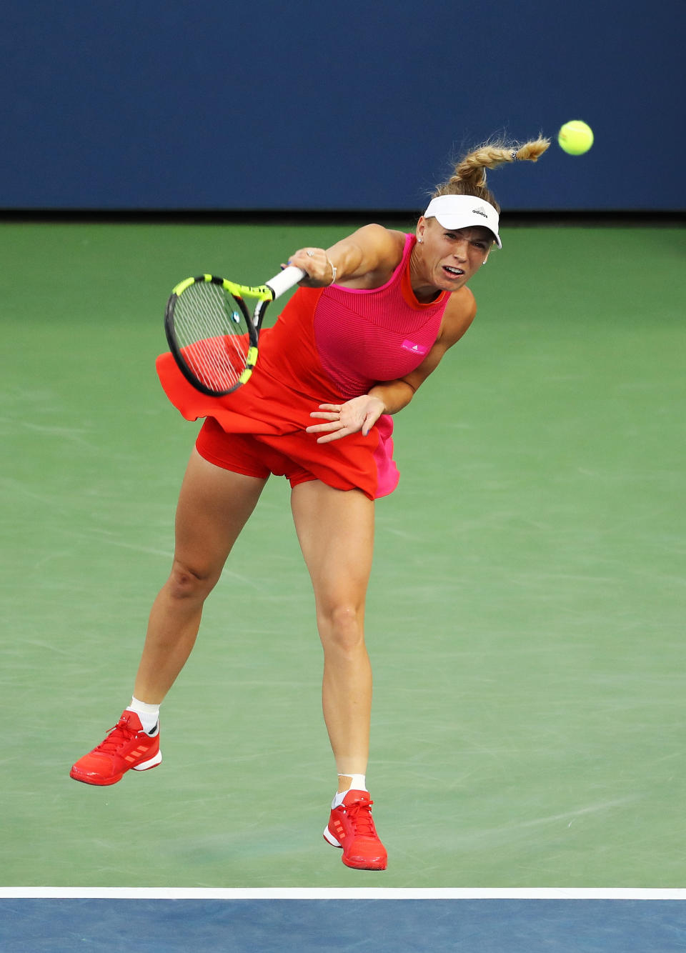 <p>Caroline Wozniacki of Denmark serves during her first round Women’s Singles match against Mihaela Buzarnescu of Romania on Day One of the 2017 US Open at the USTA Billie Jean King National Tennis Center on August 28, 2017 in the Flushing neighborhood of the Queens borough of New York City. (Photo by Elsa/Getty Images) </p>