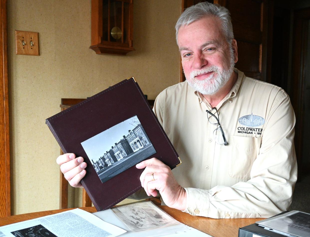 Randall Hazelbaker showed an album from Ken Klein with pictures of the original cottages on the cover.
