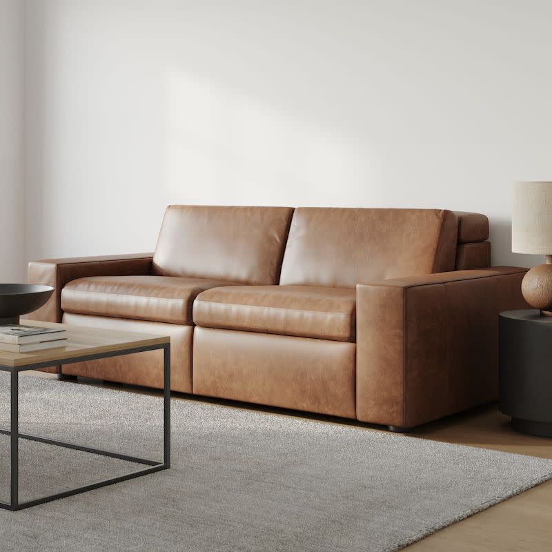 <p><a href="https://go.redirectingat.com?id=74968X1596630&url=https%3A%2F%2Fwww.westelm.com%2Fproducts%2Fenzo-leather-reclining-sofa-h4666%2F%3FcatalogId%3D71%26sku%3D2285198%26cm_ven%3DPLA%26cm_cat%3DGoogle%26cm_pla%3DFurniture%2B%253E%2BSofas%2B%2526%2BLoveseats%26region_id%3D669950%26cm_ite%3D2285198_14465075426%26gclid%3DCjwKCAiAv9ucBhBXEiwA6N8nYDNDlnU6OdE1Jsyb1Ek7kSyyGLTcqvaQ3m-jTgkpl1Q7BzceH9uVexoCGn0QAvD_BwE&sref=https%3A%2F%2Fwww.esquire.com%2Flifestyle%2Fg42217798%2Fbest-leather-sofas%2F" rel="nofollow noopener" target="_blank" data-ylk="slk:Shop Now;elm:context_link;itc:0;sec:content-canvas" class="link ">Shop Now</a></p><p>Enzo Leather Reclining Sofa</p><p>West Elm</p><p>$5958.00</p>