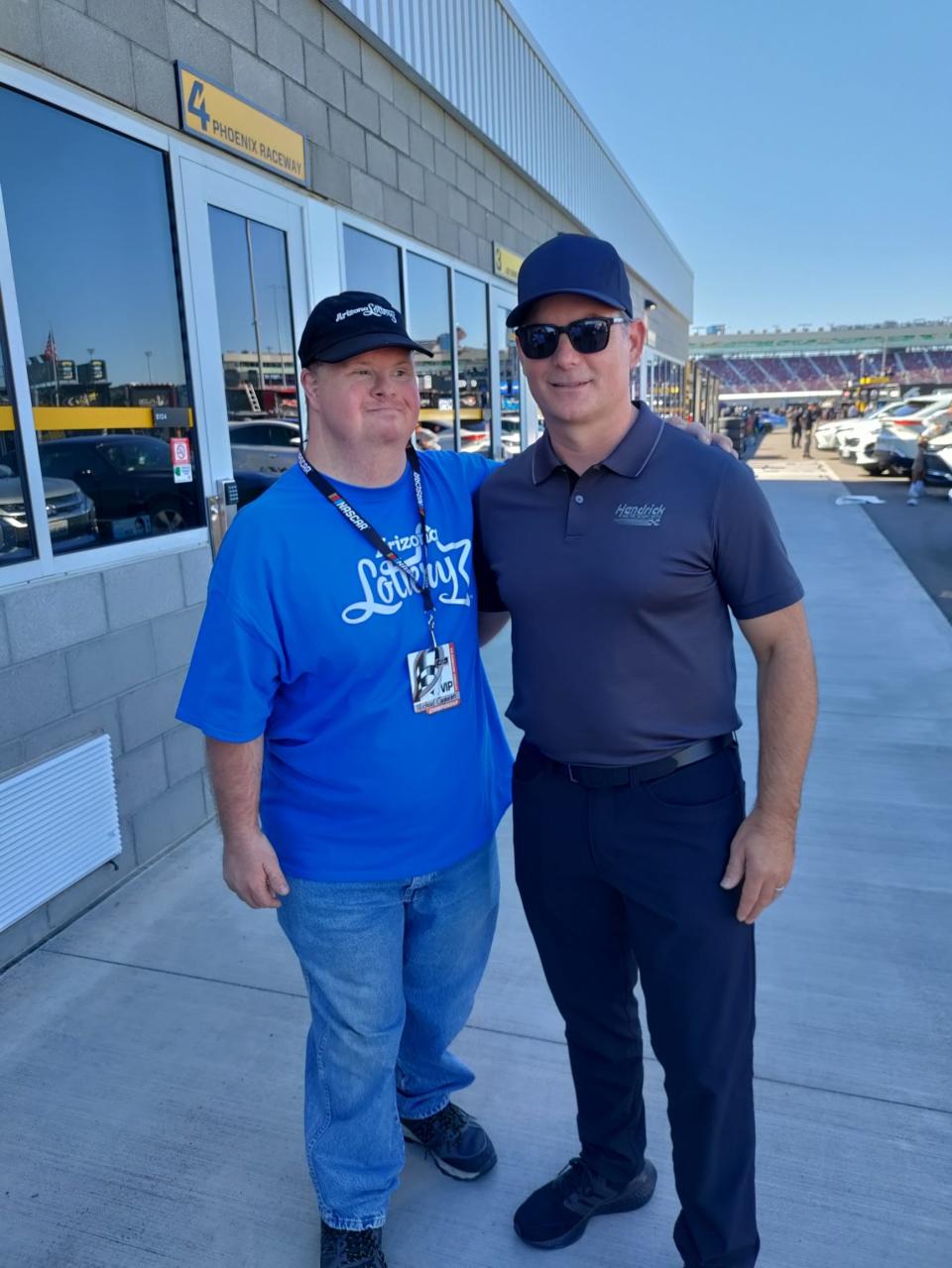 Michael Corporon and retired NASCAR driver Jeff Gordon at the Phoenix Raceway in Avondale on Saturday, Nov. 6, 2021.
