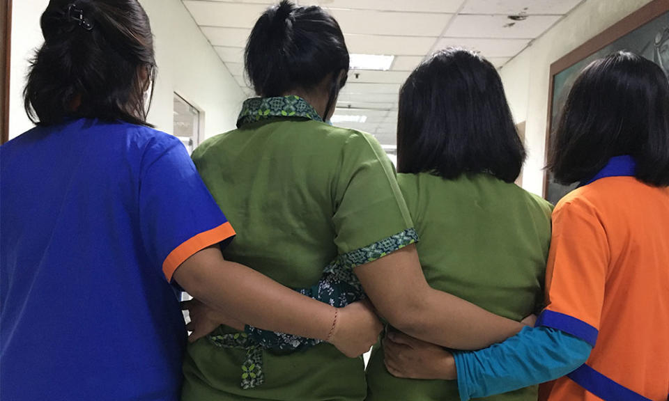 Newly recruited domestic workers getting their MyTravelPass “ticket” into Malaysia