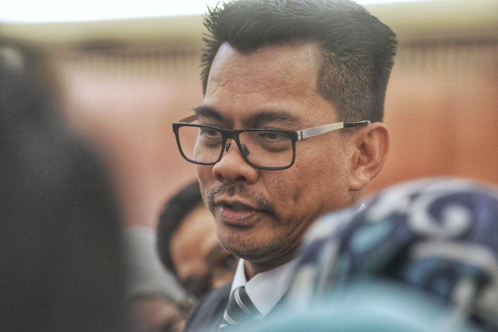 Deputy Home Minister Datuk Mohd Azis Jamman speaks to reporters at the Parliament lobby October 15, 2019.  ― Picture by Ahmad Zamzahuri