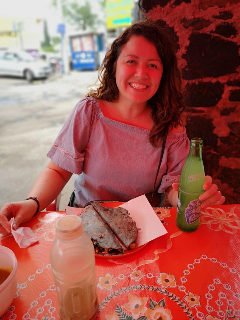 jennifer eating street quesadilla