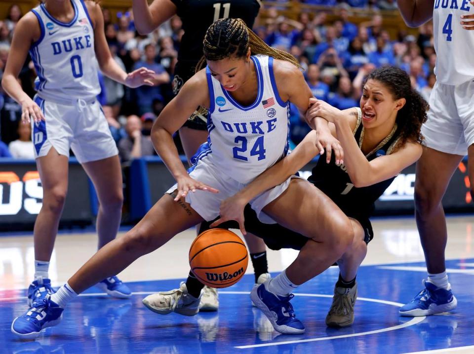 Duke’s Reigan Richardson and Colorado’s Tayanna Jones lunge for a loose ball during the second half of the Blue Devils’ 61-53 loss to Colorado in an NCAA Tournament second round game at Cameron Indoor Stadium on Monday, March 20, 2023, in Durham, N.C.