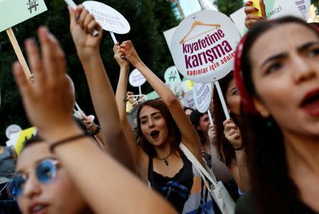 Women rights activists shout slogans during a protest against what they say are violence and animosity they face from men demanding they dress more conservatively, in Istanbul, Turkey, July 29, 2017. REUTERS/Murad Sezer