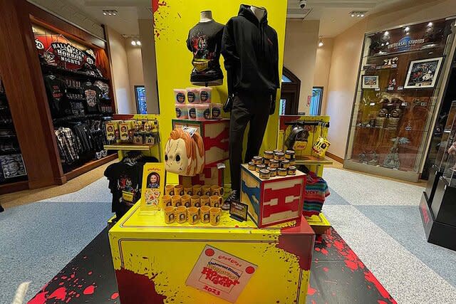 A merch display at the Chucky activation at Halloween Horror Nights 2023 at Universal Studios Hollywood.