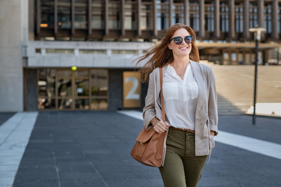 Getting up from your desk and going for a 10 minute walk can boost your energy. (Getty Images)