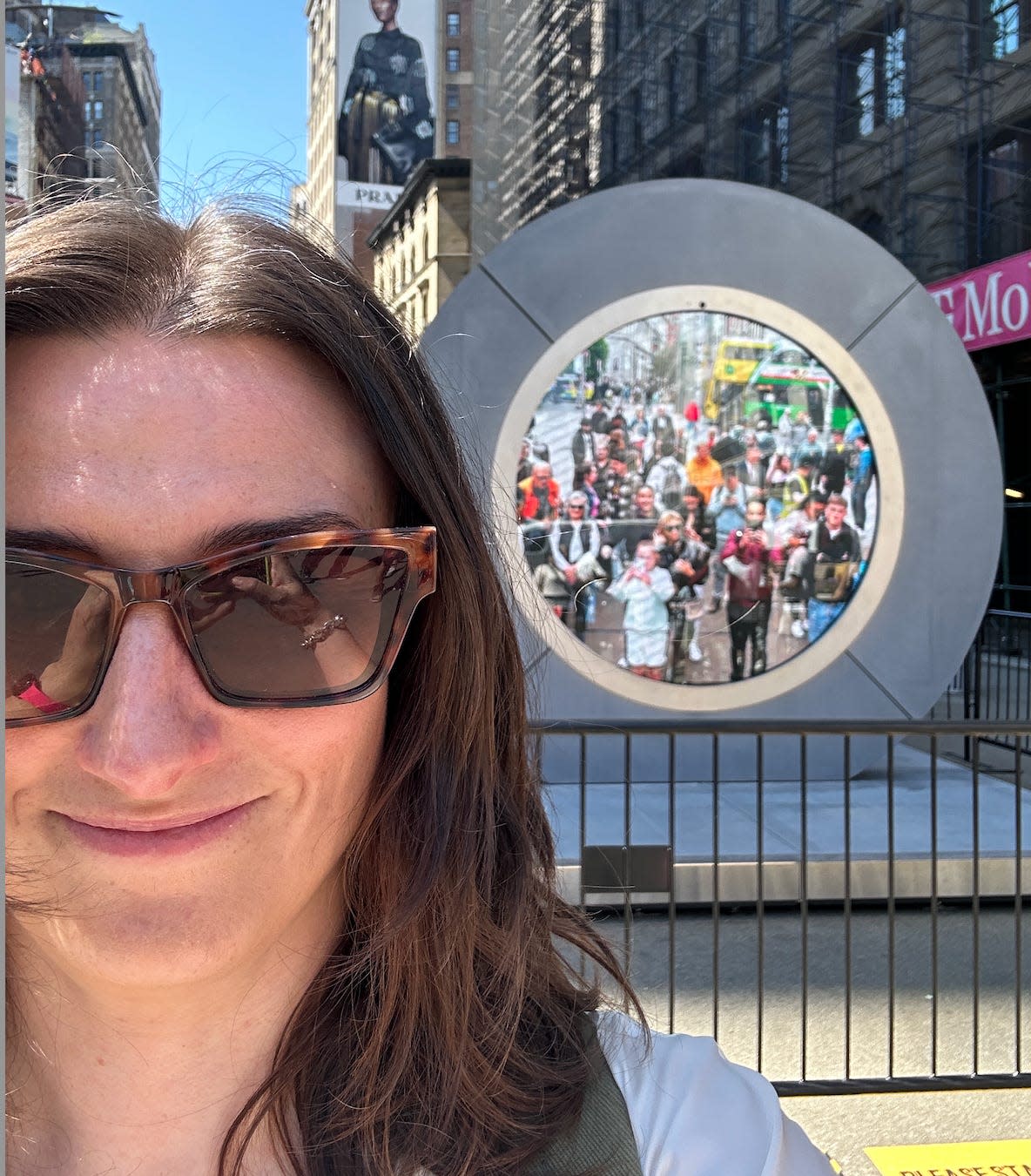 woman's face taking selfe at NYC portal