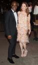 <p>Julianne kept her feathered Calvin Klein dress on for the after party.<br><i>[Photo: Getty]</i> </p>