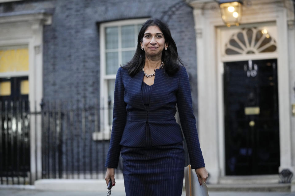 Home Secretary Suella Braverman poses for media outside 10 Downing Street in London, Tuesday, Oct. 25, 2022. Former Treasury chief Rishi Sunak became Britain's first prime minister of color after being chosen Monday to lead a governing Conservative Party desperate for a safe pair of hands to guide the country through economic and political turbulence. (AP Photo/Kin Cheung)