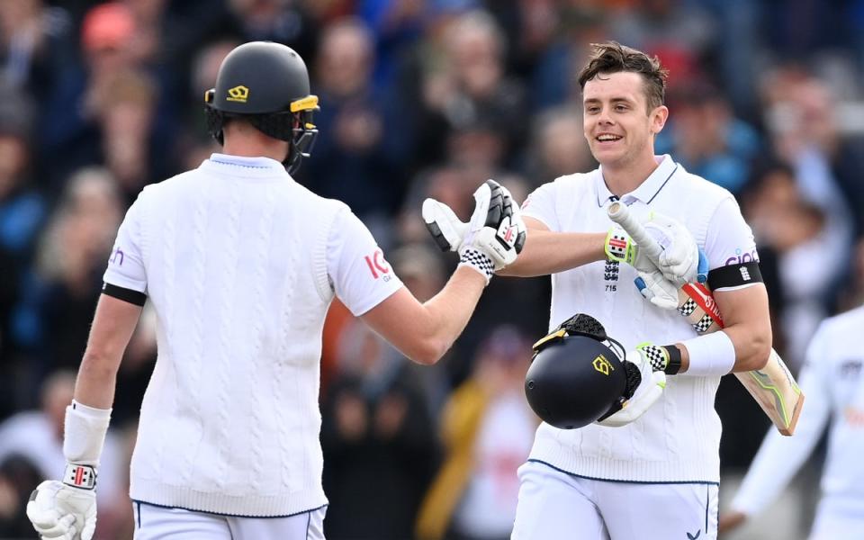 High five: Jamie Smith enjoys the moment with Gus Atkinson at Old Trafford (Getty Images)