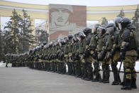 Police stand blocking approaches to the square during a protest against the jailing of opposition leader Alexei Navalny in Volgograd, Russia, Sunday, Jan. 31, 2021. Thousands of people have taken to the streets across Russia to demand the release of jailed opposition leader Alexei Navalny, keeping up the wave of nationwide protests that have rattled the Kremlin. Many chanted slogans against President Vladimir Putin. The authorities mounted a massive effort to stem the tide of demonstrations after tens of thousands rallied across the country last weekend in the most widespread show of discontent Russia has seen in years. (AP Photo/Dmitry Rogulin)