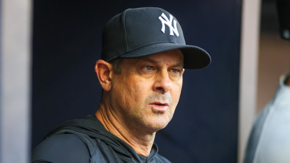 Aug 16, 2023; Atlanta, Georgia, USA; New York Yankees manager Aaron Boone (17) in the dugout before a game against the Atlanta Braves at Truist Park. Mandatory Credit: Brett Davis-USA TODAY Sports