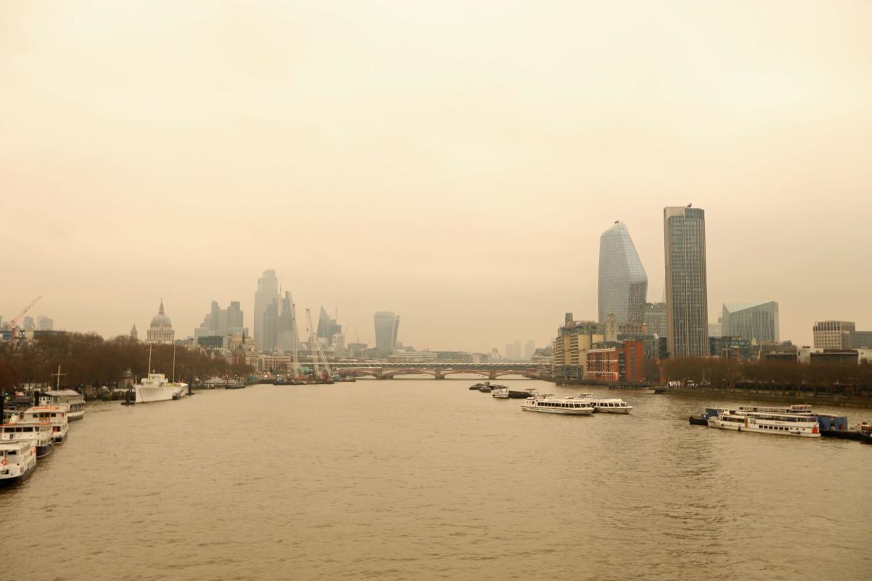 A Saharan dust cloud seen from Waterloo Bridge in London. It comes as parts of southern Spain have been blanketed following a thick plume which has turned skies orange, with satellite images clearly showing the dust over France. Picture date: Wednesday March 16, 2022.