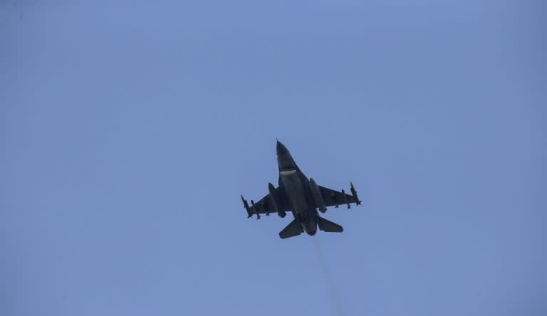 A missile-loaded Turkish Air Force warplane takes off from the Incirlik Air Base, on the outskirts of the city of Adana on July 28, 2015