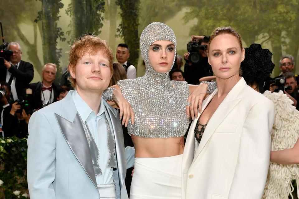 Ed Sheeran, from left, Delevingne, and Stella McCartney at the Met Gala (AP)