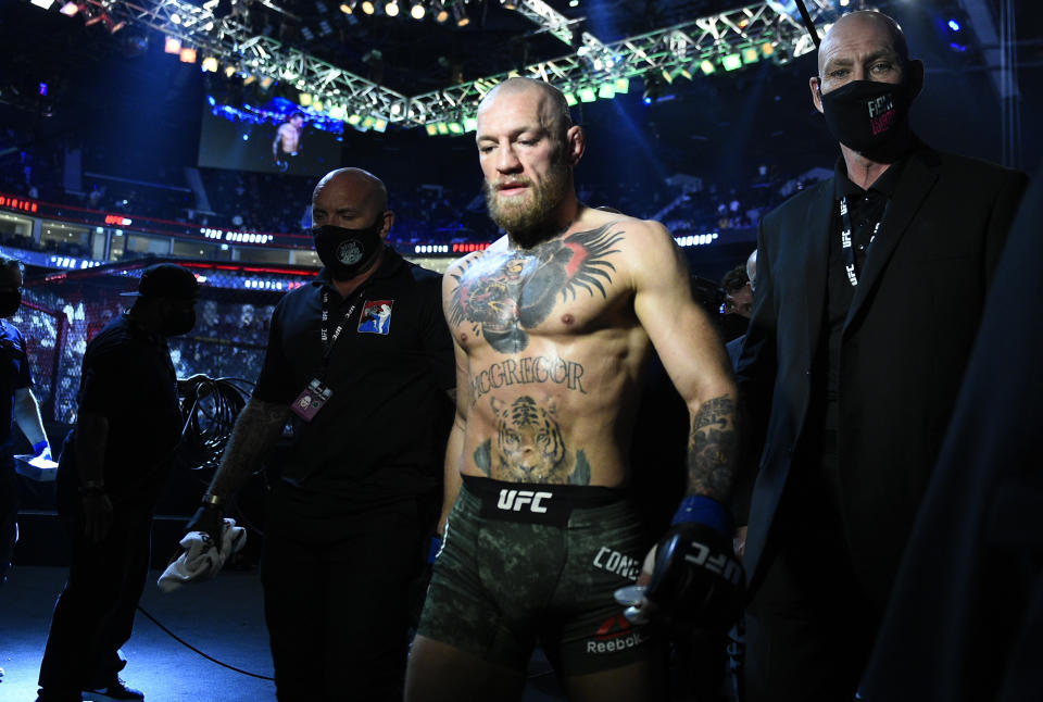 ABU DHABI, UNITED ARAB EMIRATES - JANUARY 23: Conor McGregor of Ireland reacts after his TKO loss to Dustin Poirier in a lightweight fight during the UFC 257 event inside Etihad Arena on UFC Fight Island on January 23, 2021 in Abu Dhabi, United Arab Emirates. (Photo by Chris Unger/Zuffa LLC)